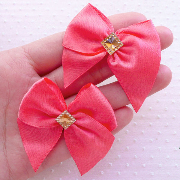 Pink gift ribbon bow. Pink red satin ribbon with knotted bow gift